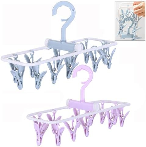 Blue baby clothes drying hangers with clips