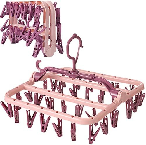 Pink plastic hanger with 32 clips
