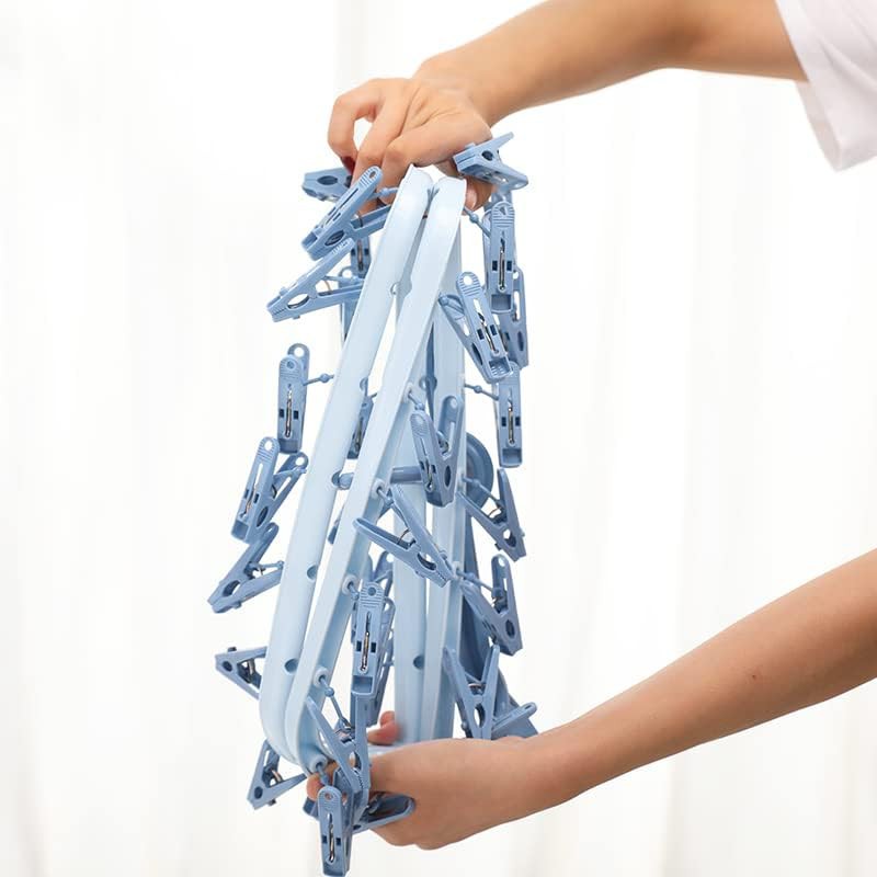 Blue plastic hanger with 32 clips — photo 4
