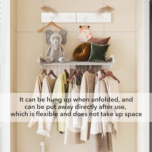 Retractable 31.5 in wall clothes rack — photo 3