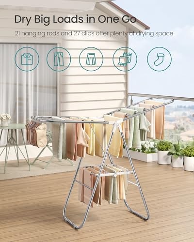 Foldable metal airer with laundry clips — photo 3